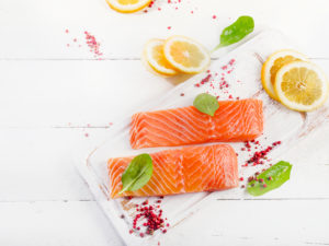 Fresh salmon fillet with herbs, spices and lemon. Healthy food. Diet  concept. Top view